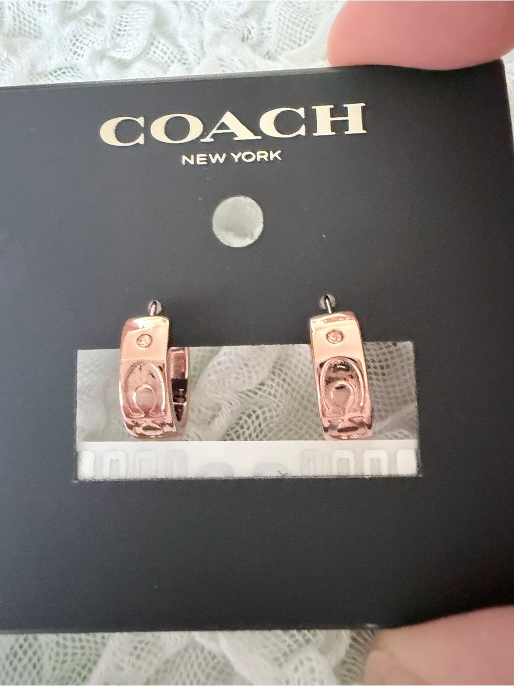 Coach Rose Gold Signature Embossed Huggie Earrings